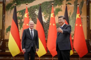 101066130 Chinese President Xi Jinping R Welcomes German Chancellor Olaf Scholz At The Great Hal