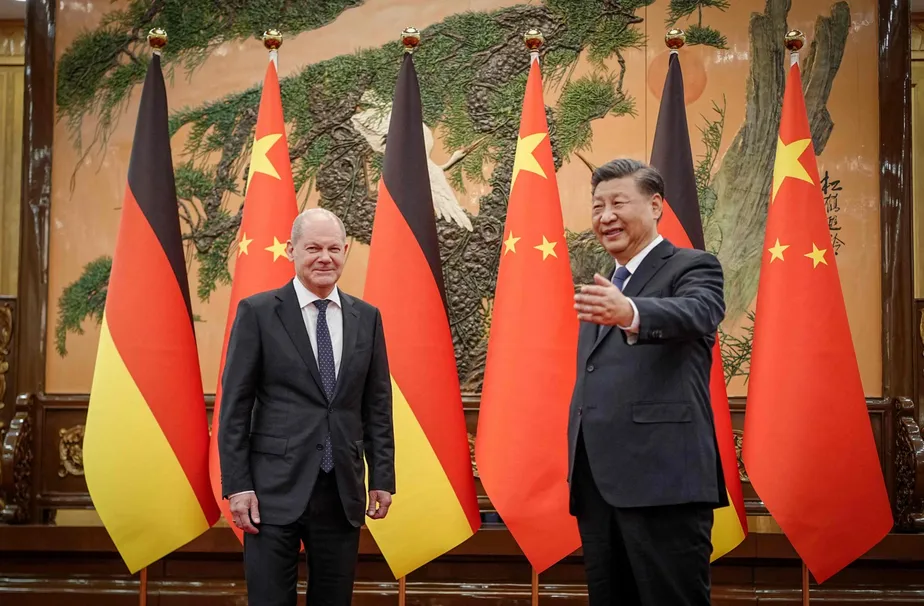 101066130 Chinese President Xi Jinping R Welcomes German Chancellor Olaf Scholz At The Great Hal